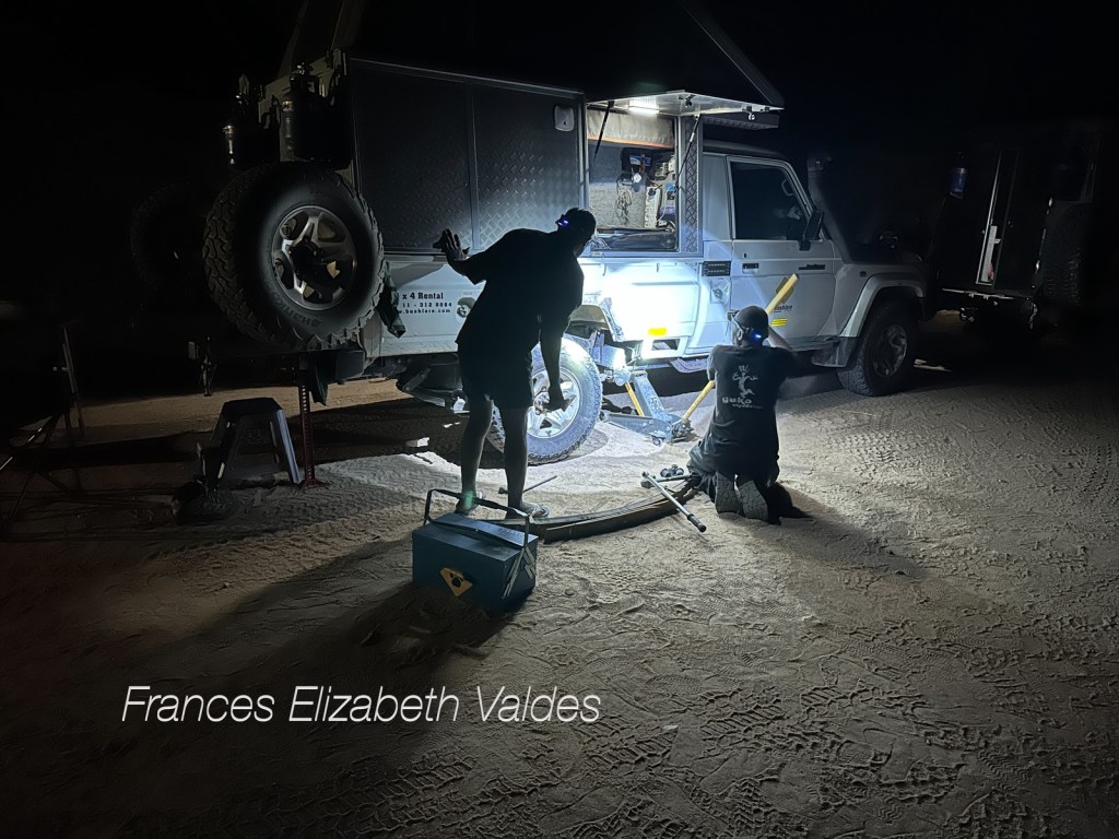 Mechanics from Bushlore mend the land cruiser in the dark