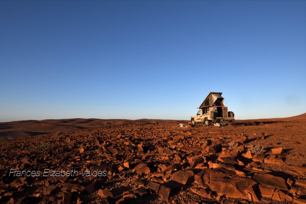 Land Cruiser with roof top tent erected at Blackridge Palmwag, Kaokoland, Namibia